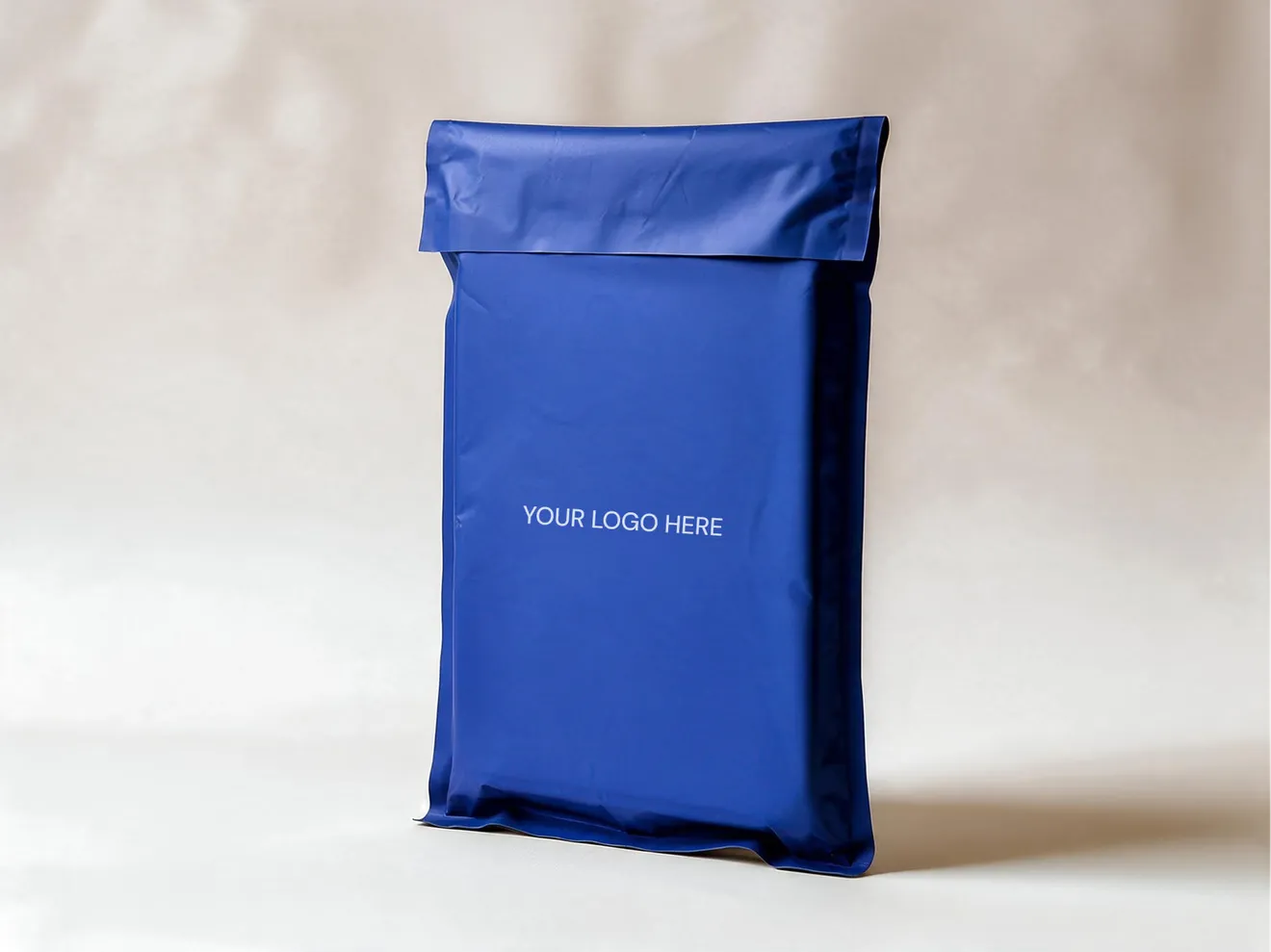 A navy insulated metallic mailer printed with a "Your logo here" placeholder.